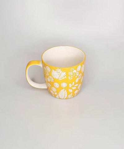 TAZA FLORES EN RELIEVE AMARILLO