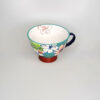 TAZA FLORES FONDO VERDE