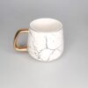 Taza Marmoleada Blanca y Dorada