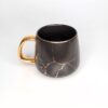 Taza Marmoleada Negro y Dorado