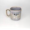 Taza Borde Cuadrado Gris y Dorado
